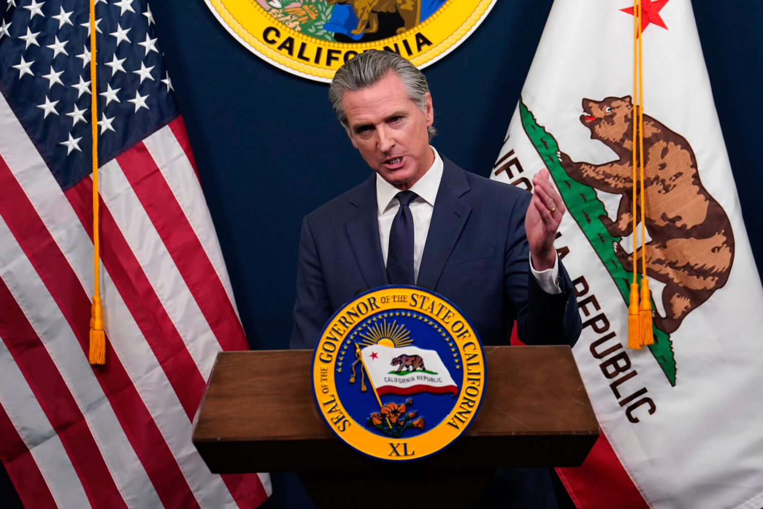 Calif. Gov. Gavin Newsom presents his revised 2025-2026 state budget during a news conference in Sa...