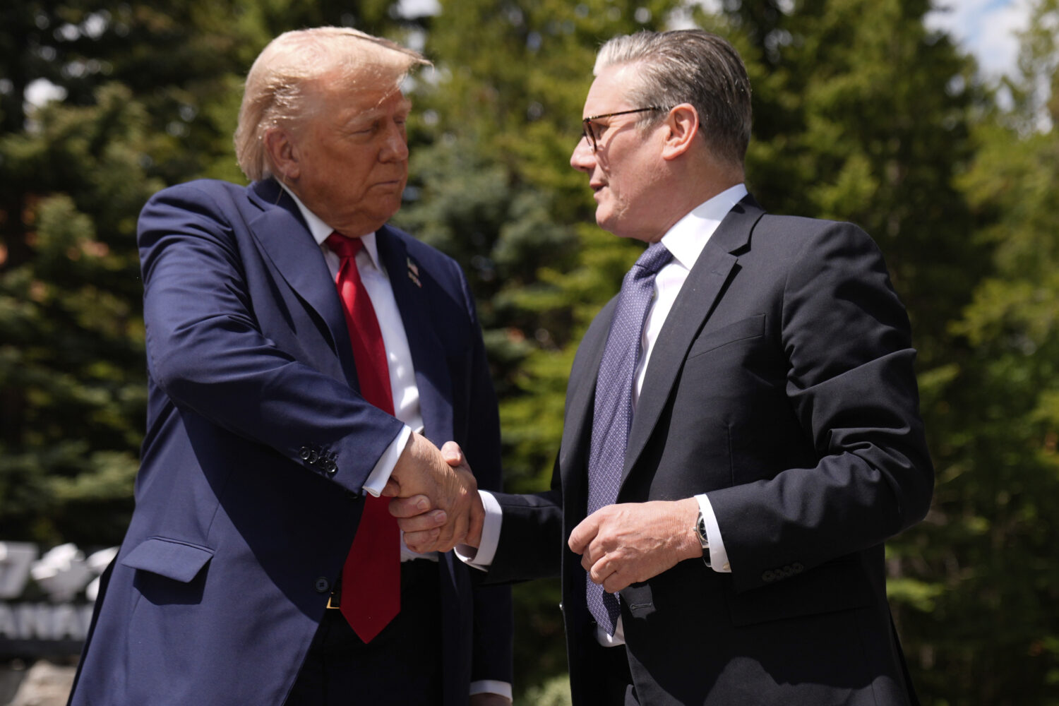President Donald Trump meets with Britain's Prime Minister Keir Starmer on the sidelines of the G7 ...