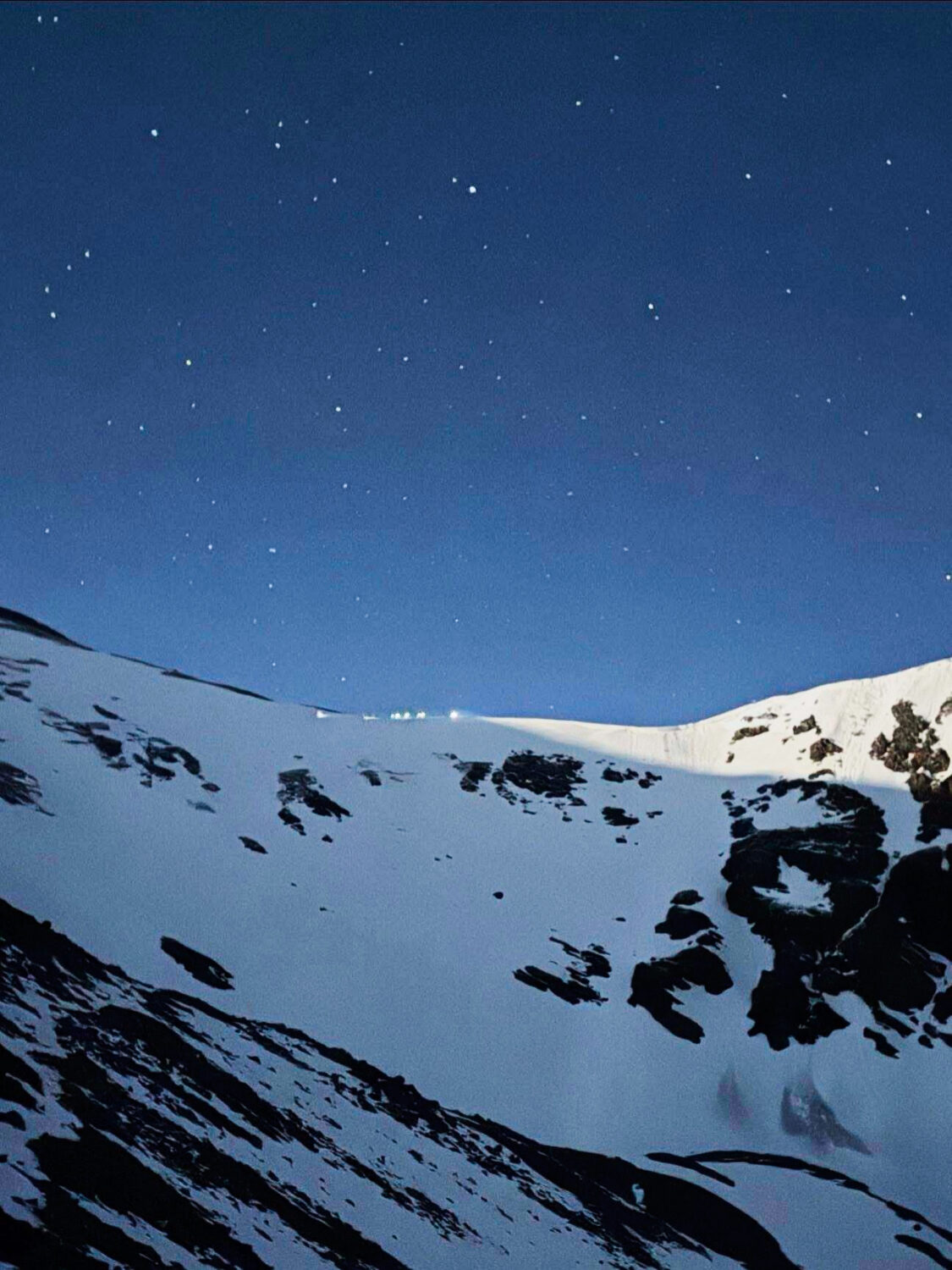 In this image provided by the Alpine Rescue Team, lamps are illuminated on a ridge as Alpine Rescue...