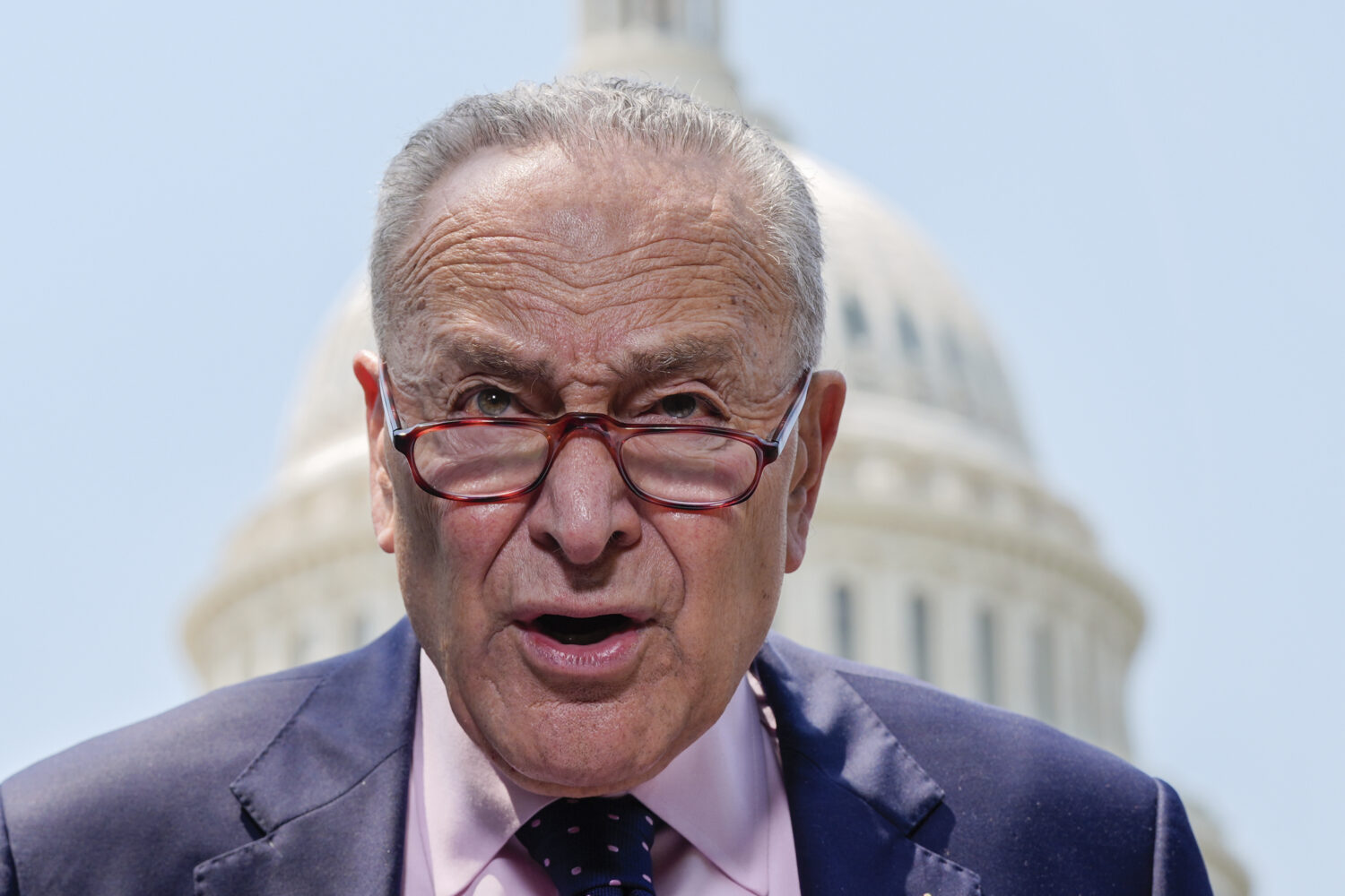 Senate Minority Leader Chuck Schumer, D-N.Y., speaks at a news conference on President Donald Trump...