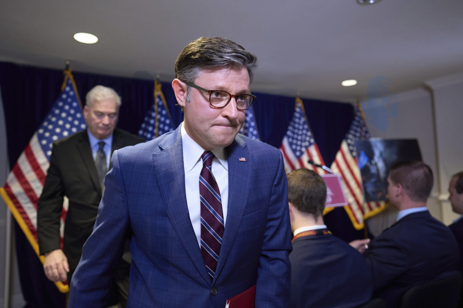 Speaker of the House Mike Johnson, R-La., and the Republican leadership depart a news conference af...