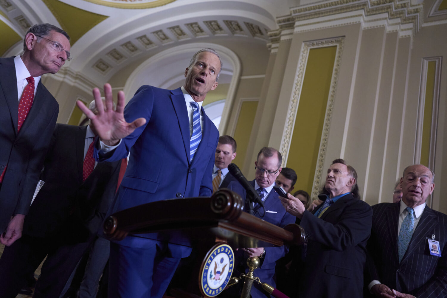 Senate Majority Leader John Thune, R-S.D., joined at left by Sen. John Barrasso, R-Wyo., the GOP wh...