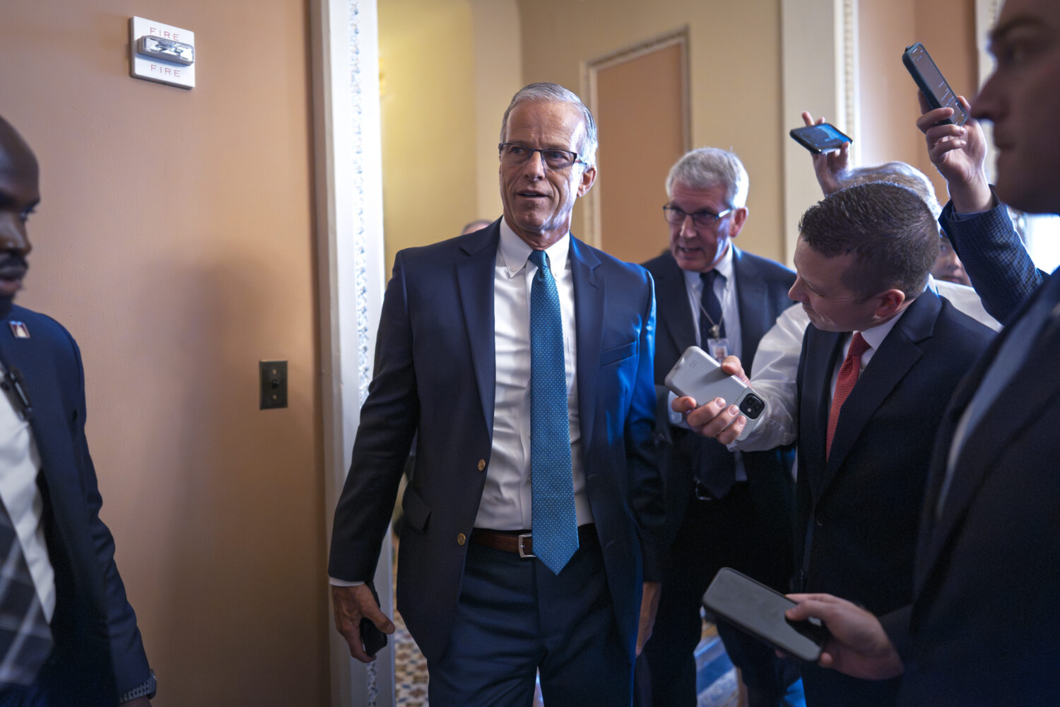 Senate Majority Leader John Thune, R-S.D., arrives for a closed-door Republican meeting to advance ...