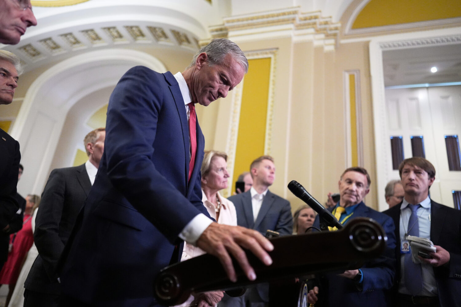 Senate Majority Leader John Thune, R-S.D., speaks to reporters following closed-door party meetings...