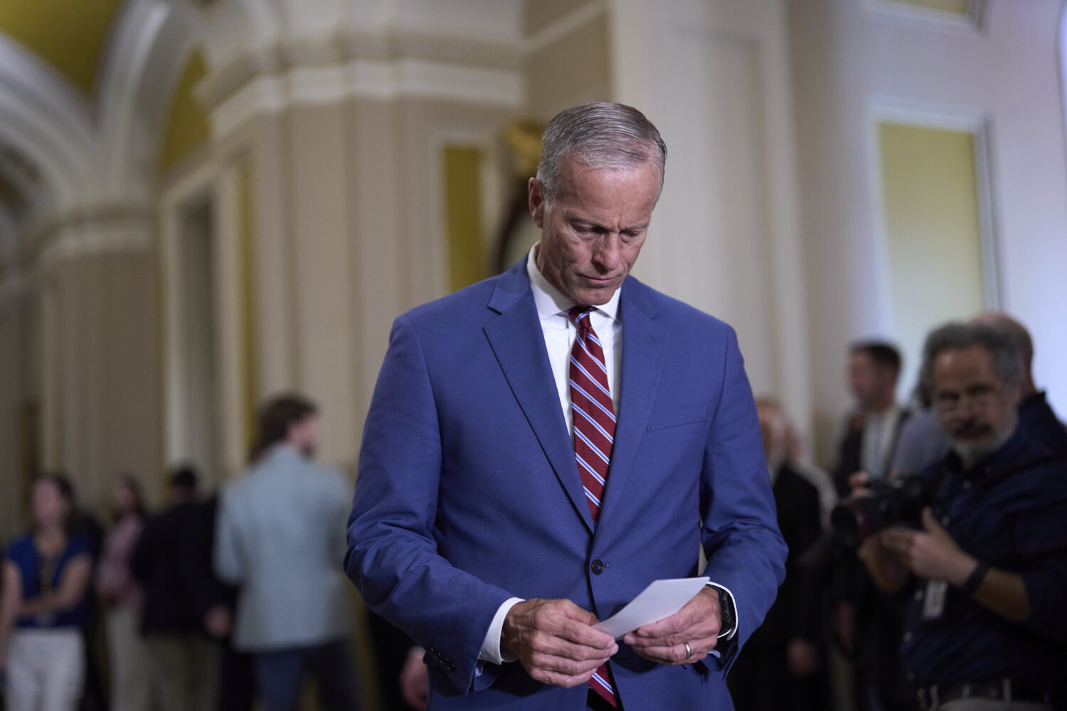 Senate Majority Leader John Thune, R-S.D., arrives to speak with reporters about the reconciliation...