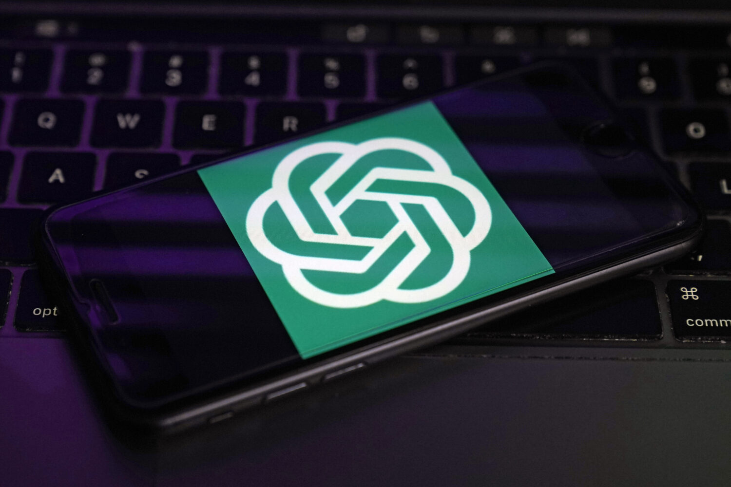FILE - The logo for OpenAI, the maker of ChatGPT, appears on a mobile phone, in New York, Tuesday, ...