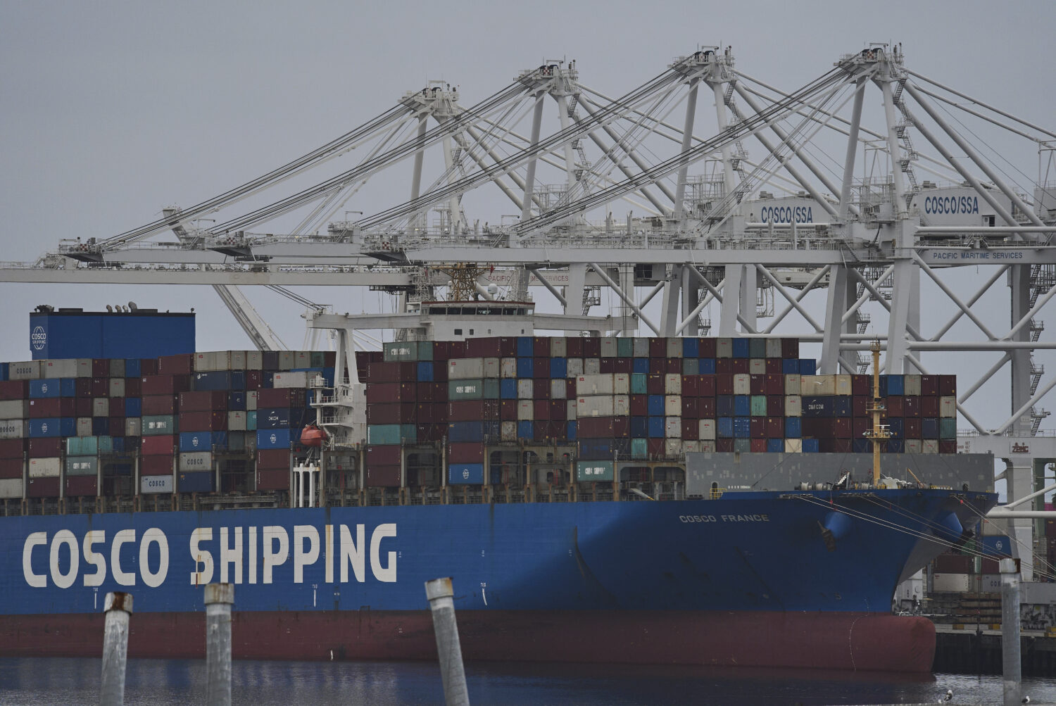 FILE -The "Cosco Shipping France" container ship is moored at the Long Beach Container Terminal, LB...