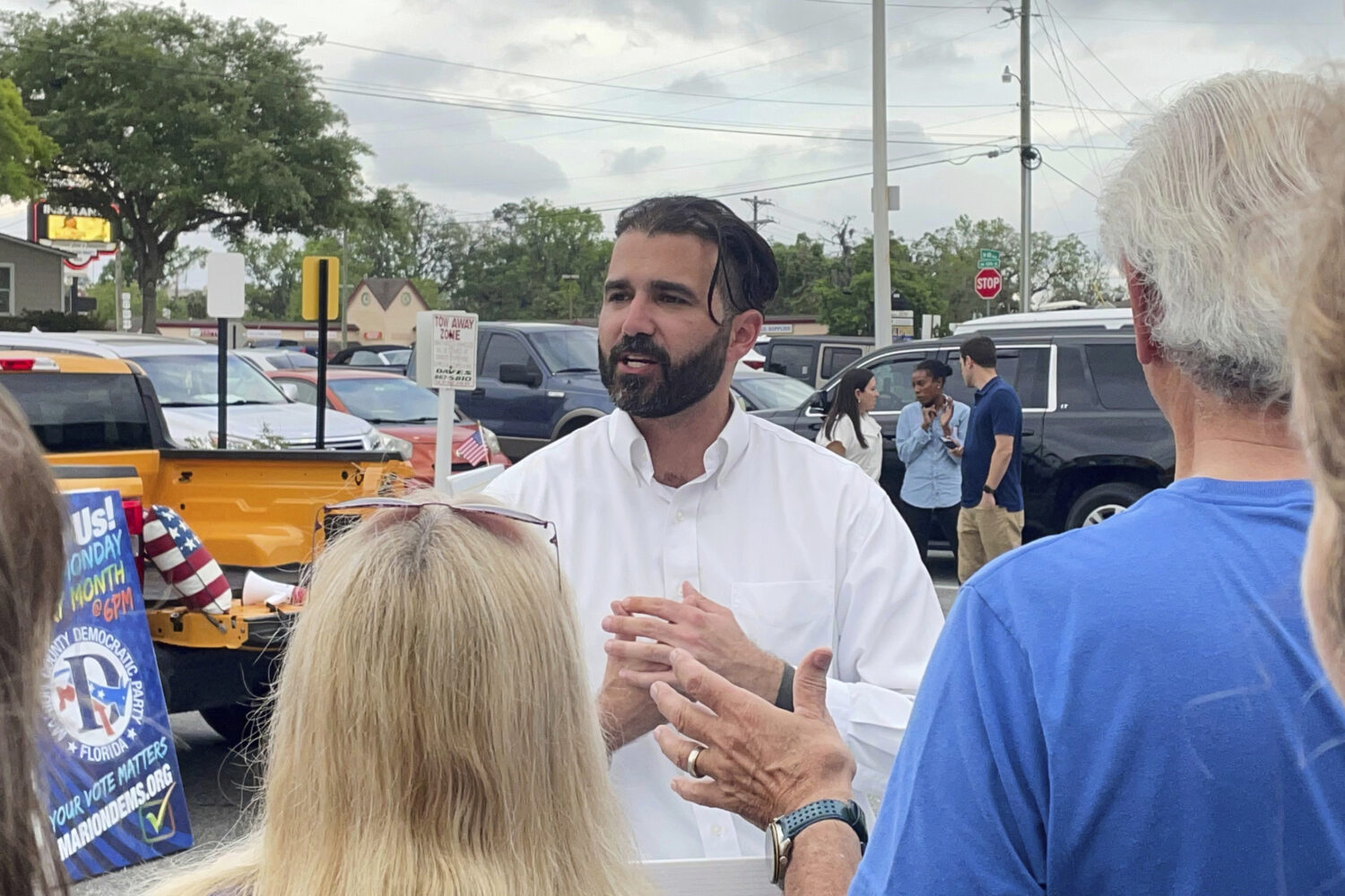FILE - Josh Weil talks to a group of supporters during a Get Out the Vote event in Ocala, Fla., Mon...