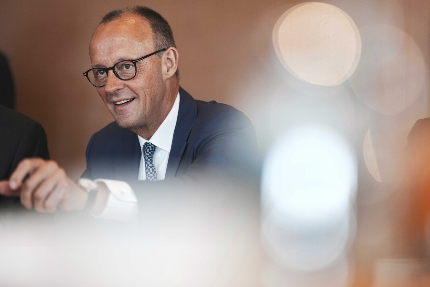 German Chancellor Friedrich Merz arrives for the cabinet meeting at the chancellery in Berlin, Germ...