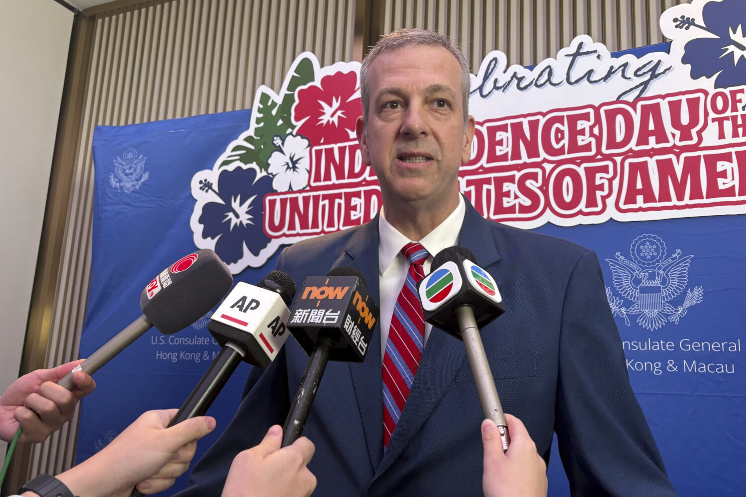 U.S. Consul General in Hong Kong Gregory May speaks to reporters at the Independence Day Reception ...