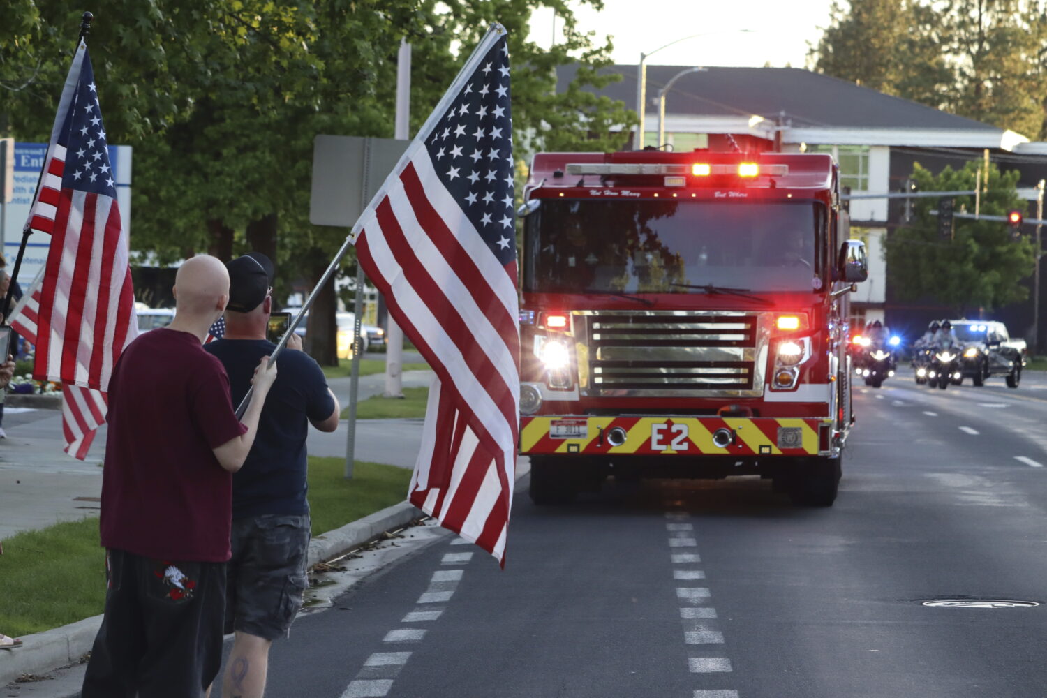 A procession from Kootenai Health headed to Spokane after a few firefighters were killed Sunday, Ju...