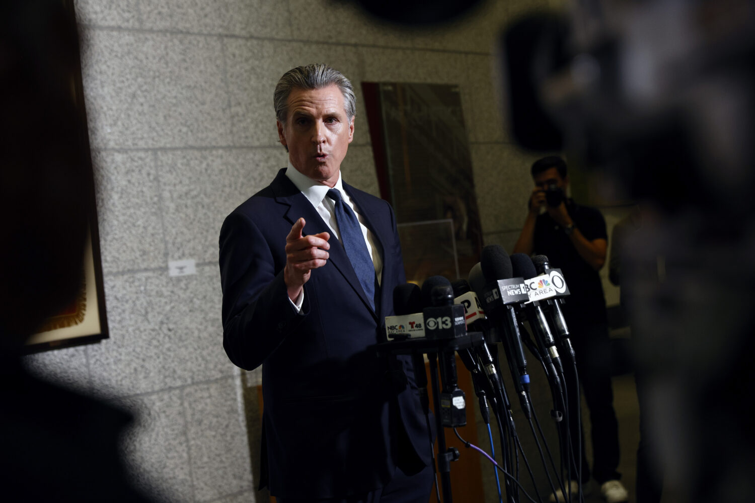 Gov. Gavin Newsom speaks after U.S. District Judge Charles Breyer granted an emergency temporary re...