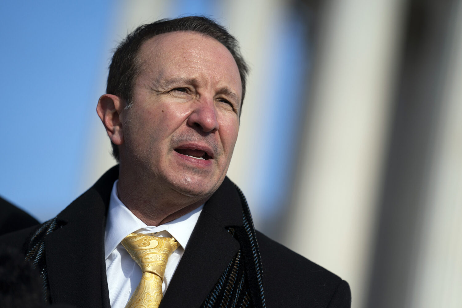 FILE - Louisiana Attorney General Jeff Landry talks to reporters outside the Supreme Court, Jan. 7,...
