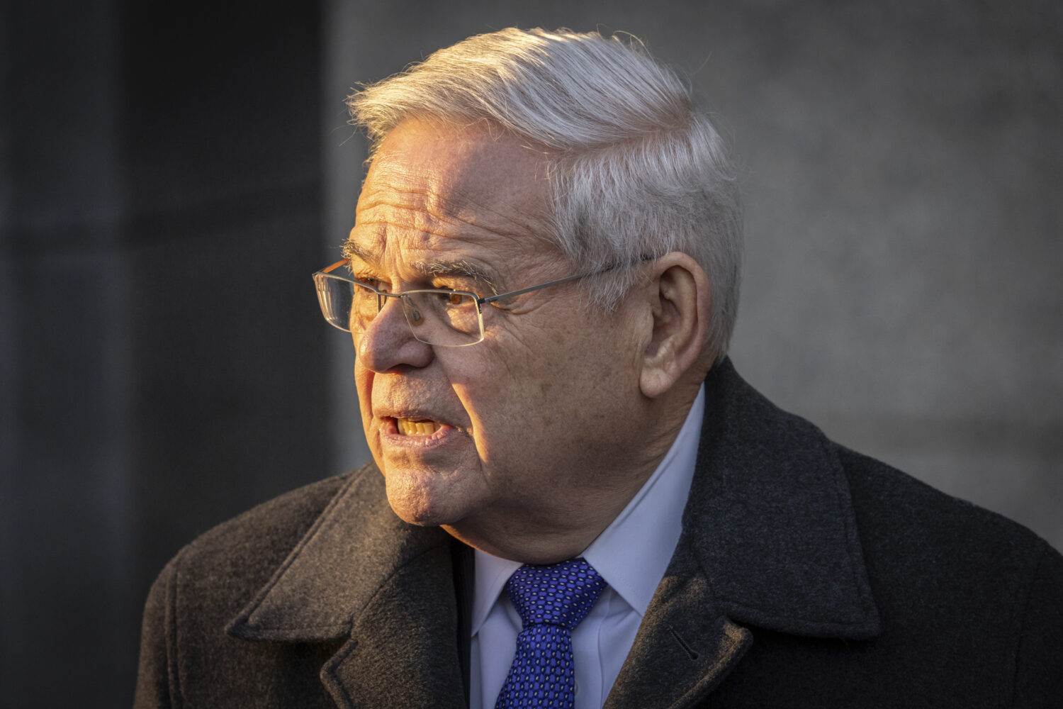 FILE - Former Sen. Bob Menendez, D-N.J., speaks to reporters outside federal court in New York, Jan...