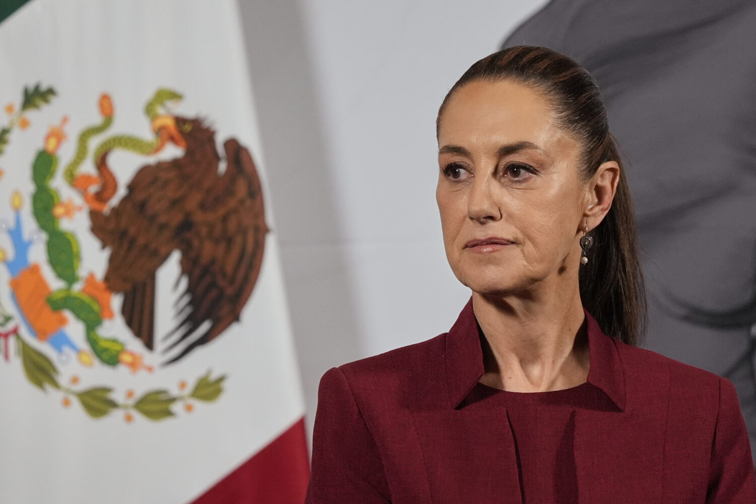 FILE - Mexican President Claudia Sheinbaum attends her morning press conference at the National Pal...