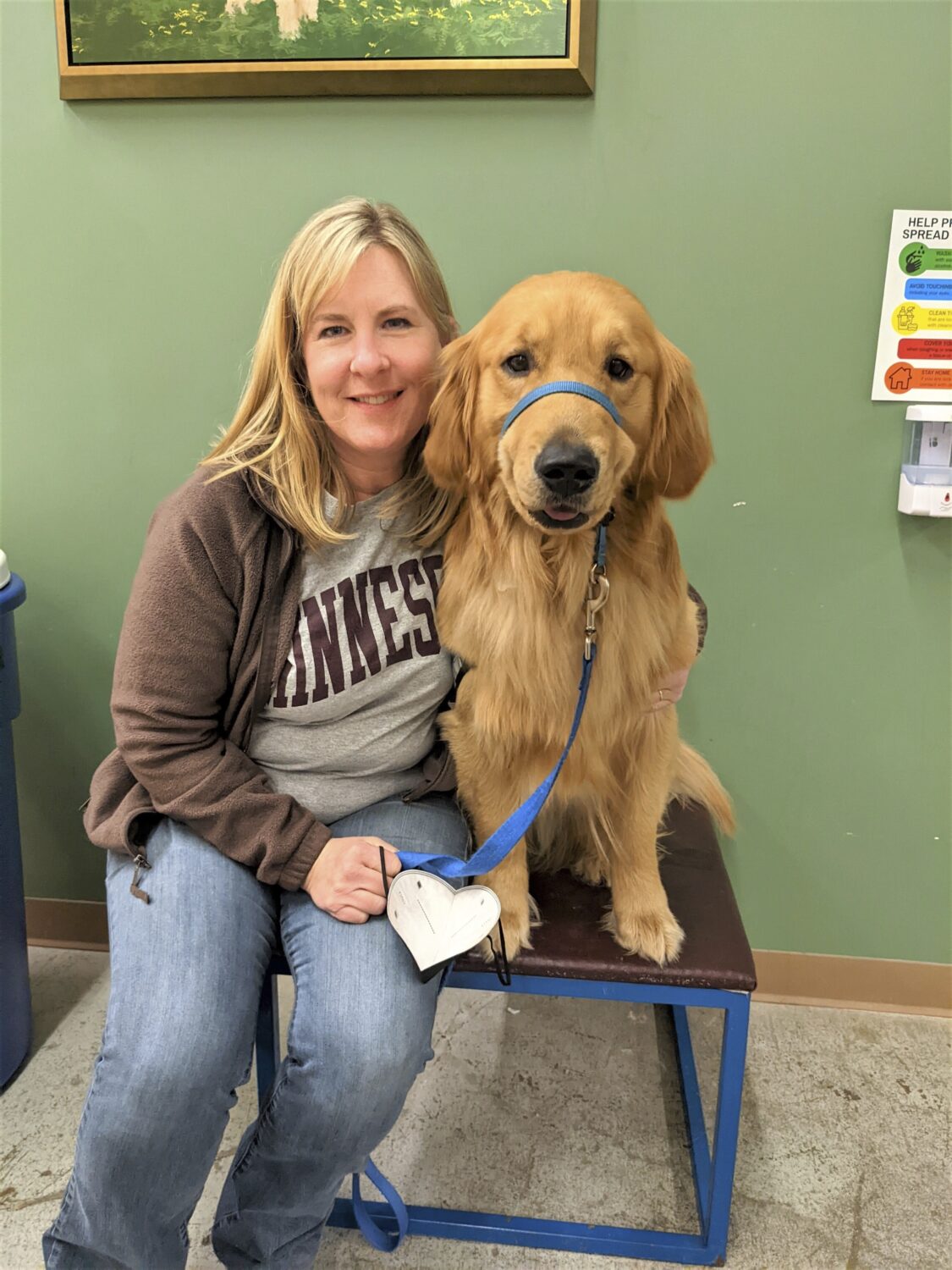 In this photo from 2022, provided by Helping Paws of Eden Prairie, Minn., state Rep. Melissa Hortma...