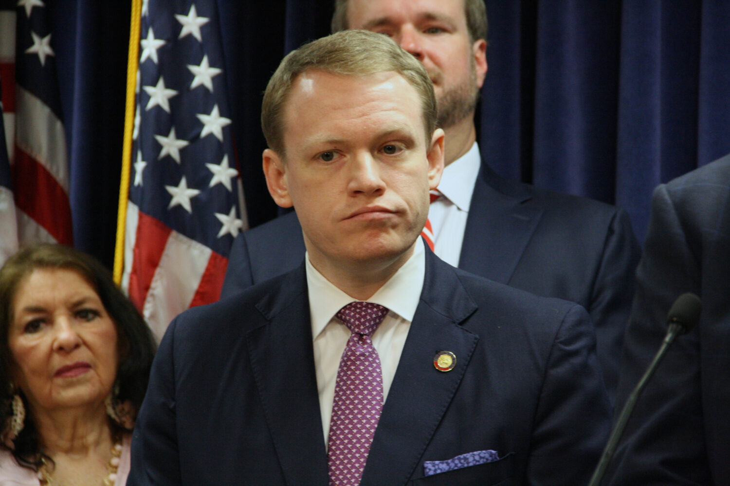 House Speaker Destin Hall stands amid other representatives as they discuss the North Carolina Hous...