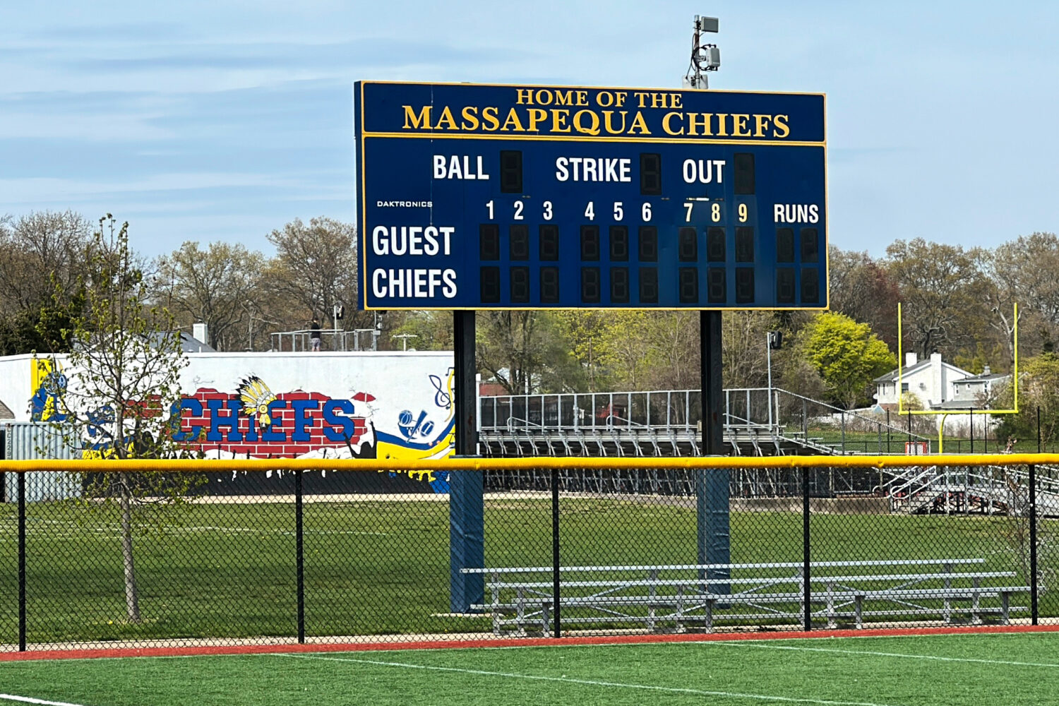 FILE - Chiefs signs and logos are displayed Massapequa High School in Massapequa, N.Y., Friday, Apr...