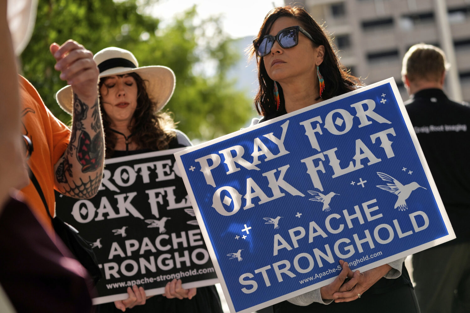 FILE - Members of Apache and others who want to halt a massive copper mining project on federal lan...