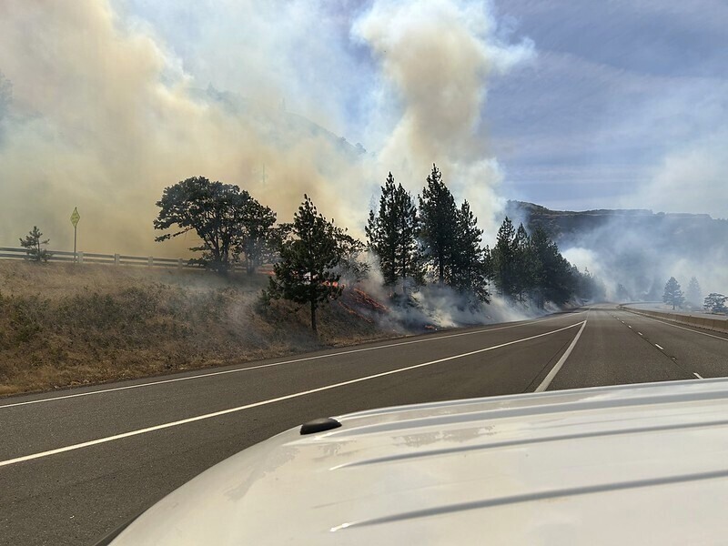 A photo provided by the Oregon Department of Transportation shows a wildfire burning in the median ...