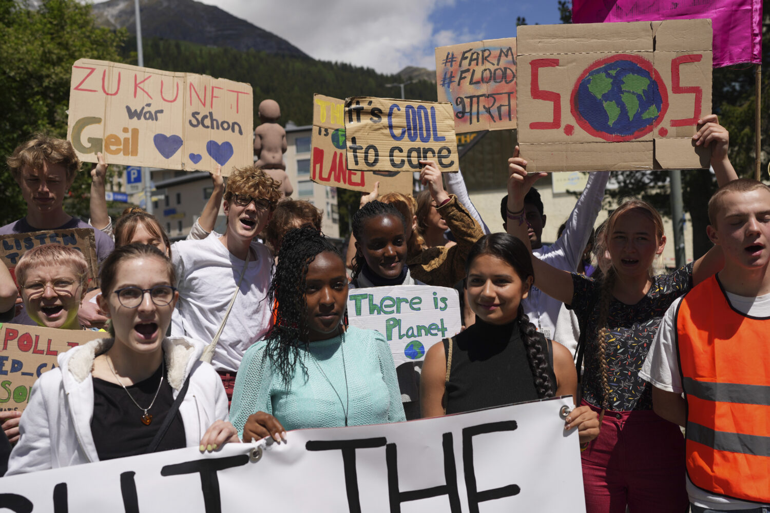 FILE - Climate activists Elizabeth Wathuti, of Kenya, Vanessa Nakate, of Uganda, and Helena Gualing...