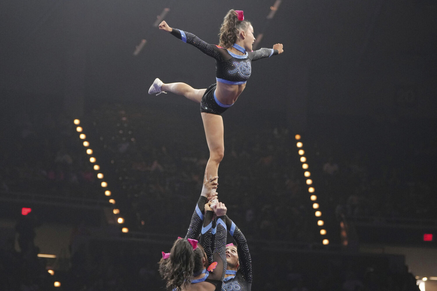 In this image provided by Varsity Spirit, cheerleaders compete during a Varsity Spirit event in Mar...