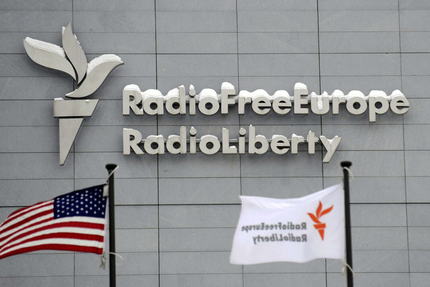 FILE - The headquarters of Radio Free Europe/Radio Liberty (RFE/RL) is seen with the American flag ...