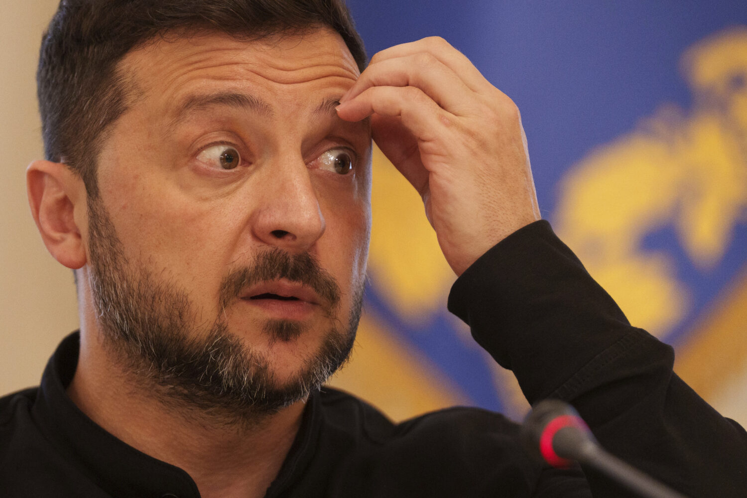 Ukrainian President Volodymyr Zelenskyy speaks to journalists during a press conference in Kyiv, Uk...