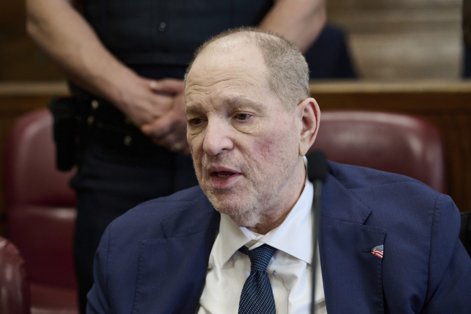 Harvey Weinstein jokes with press photographers in Manhattan criminal court as the jury in his retr...