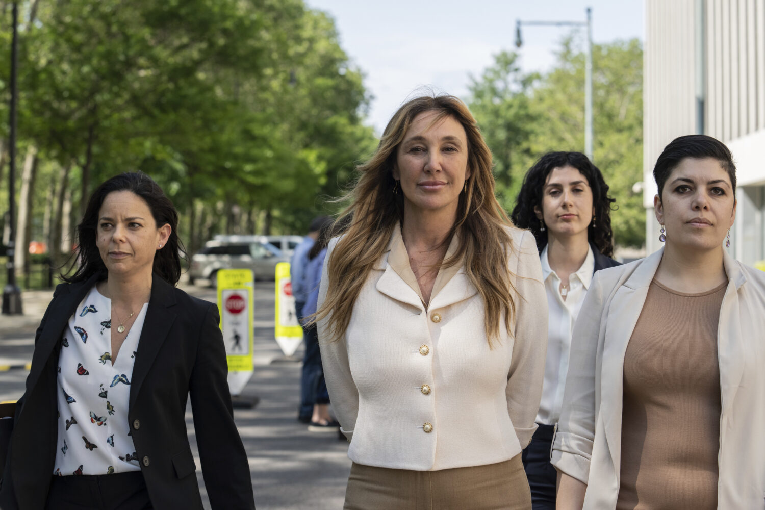 FILE - Nicole Daedone, center, founder and former CEO of OneTaste, departs Brooklyn federal court o...