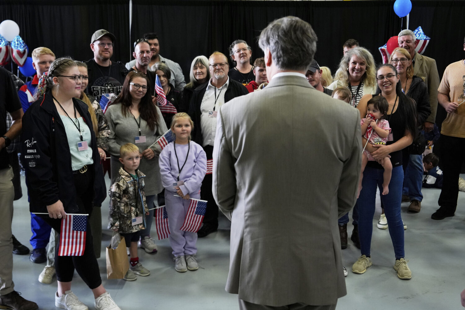 FILE - Deputy Secretary of State Christopher Landau greets Afrikaner refugees from South Africa, Ma...