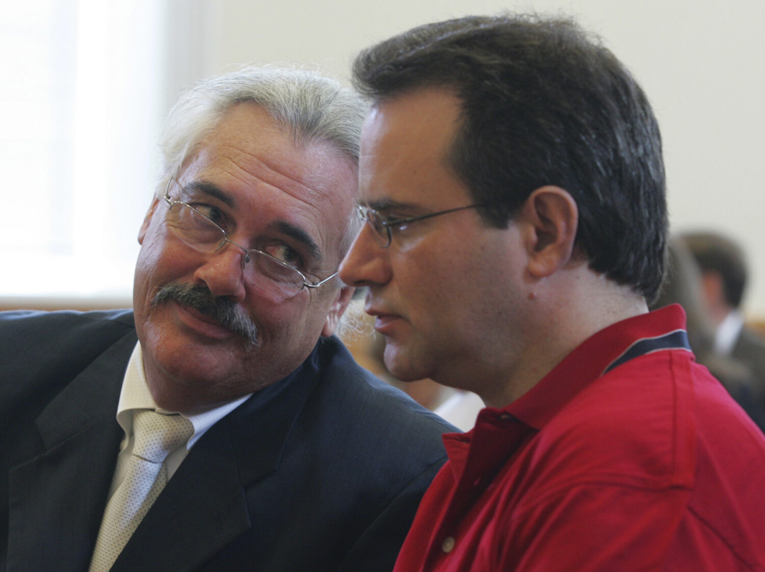 FILE - Defense attorney Gerald Kelly confers with defendant Stephen Stanko during a pretrial hearin...
