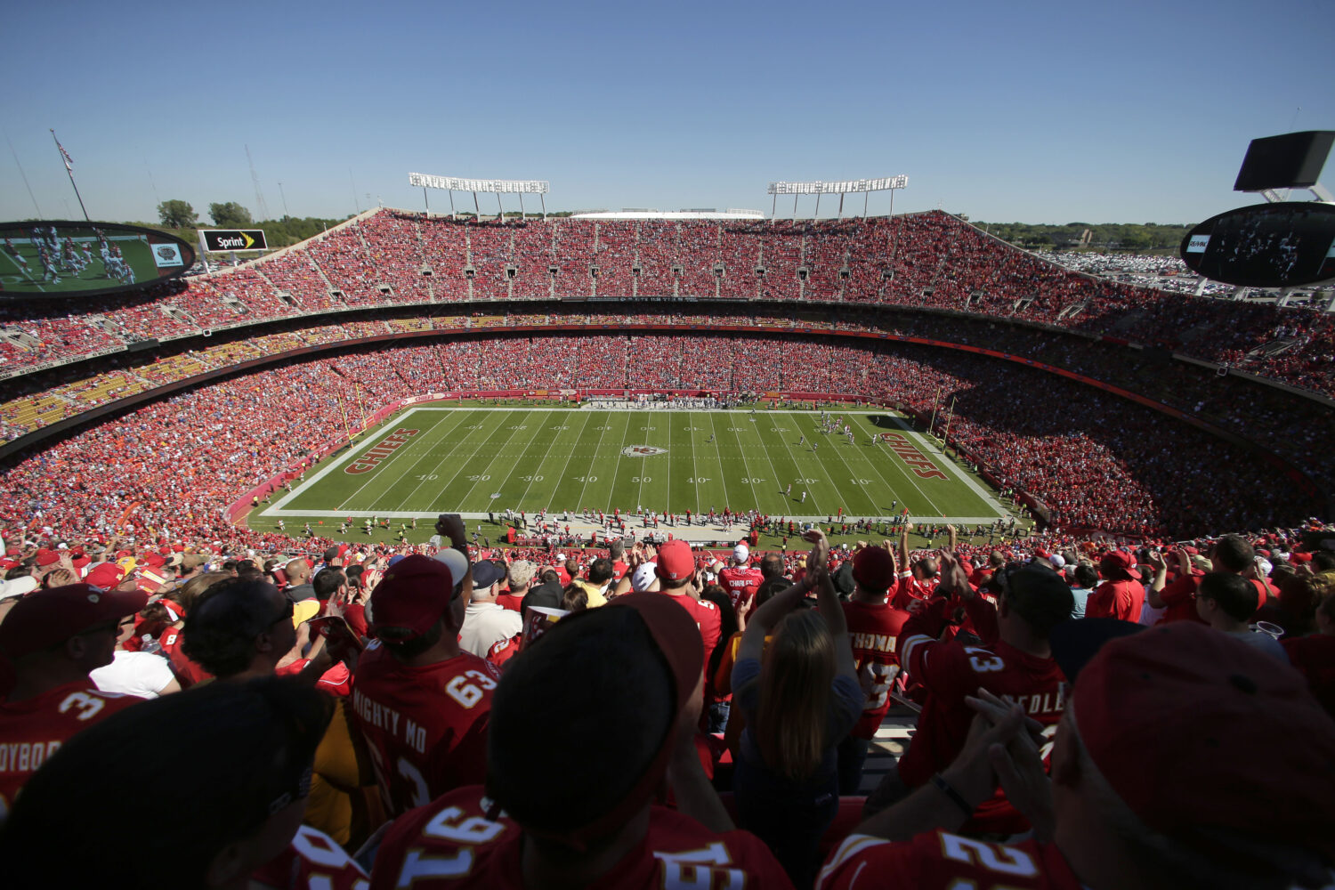 FILE - Fans watch an NFL football game between the Kansas City Chiefs and the New York Giants at Ar...