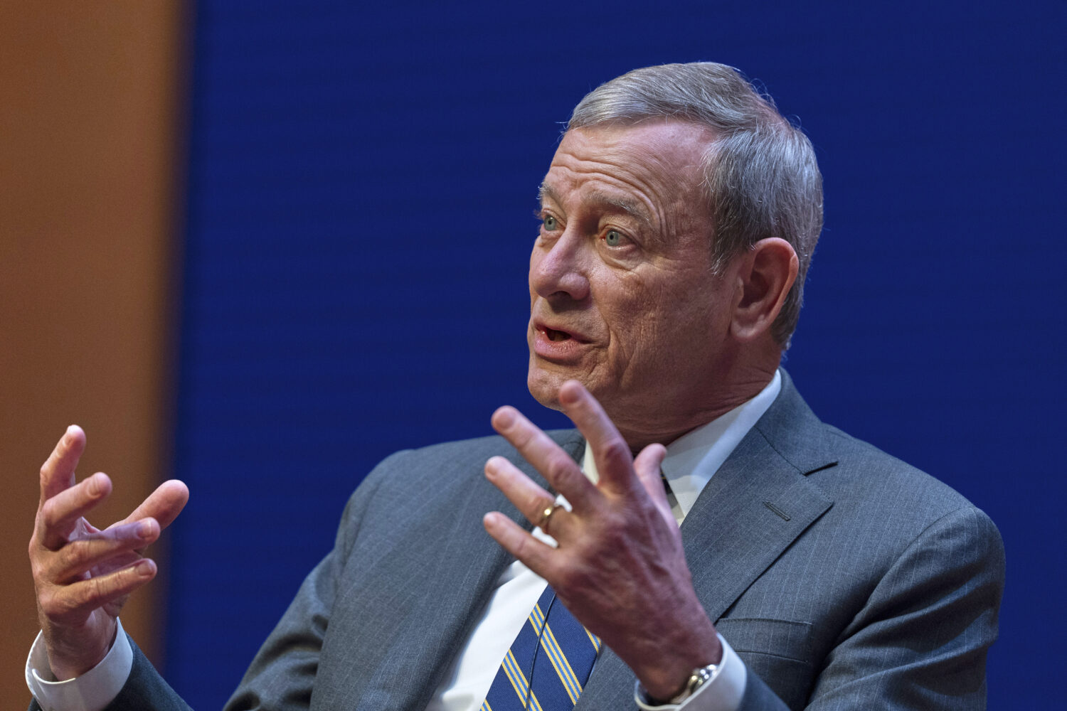 FILE - Chief Justice of the U.S. Supreme Court John Roberts speaks during a lecture to the Georgeto...