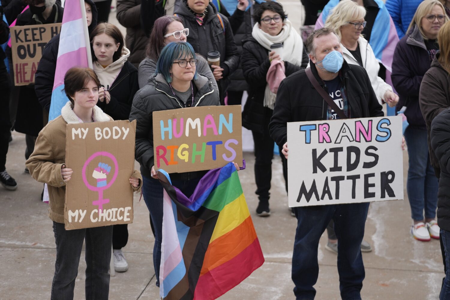 FILE - People gather in support of transgender youth during a rally at the Utah State Capitol Tuesd...