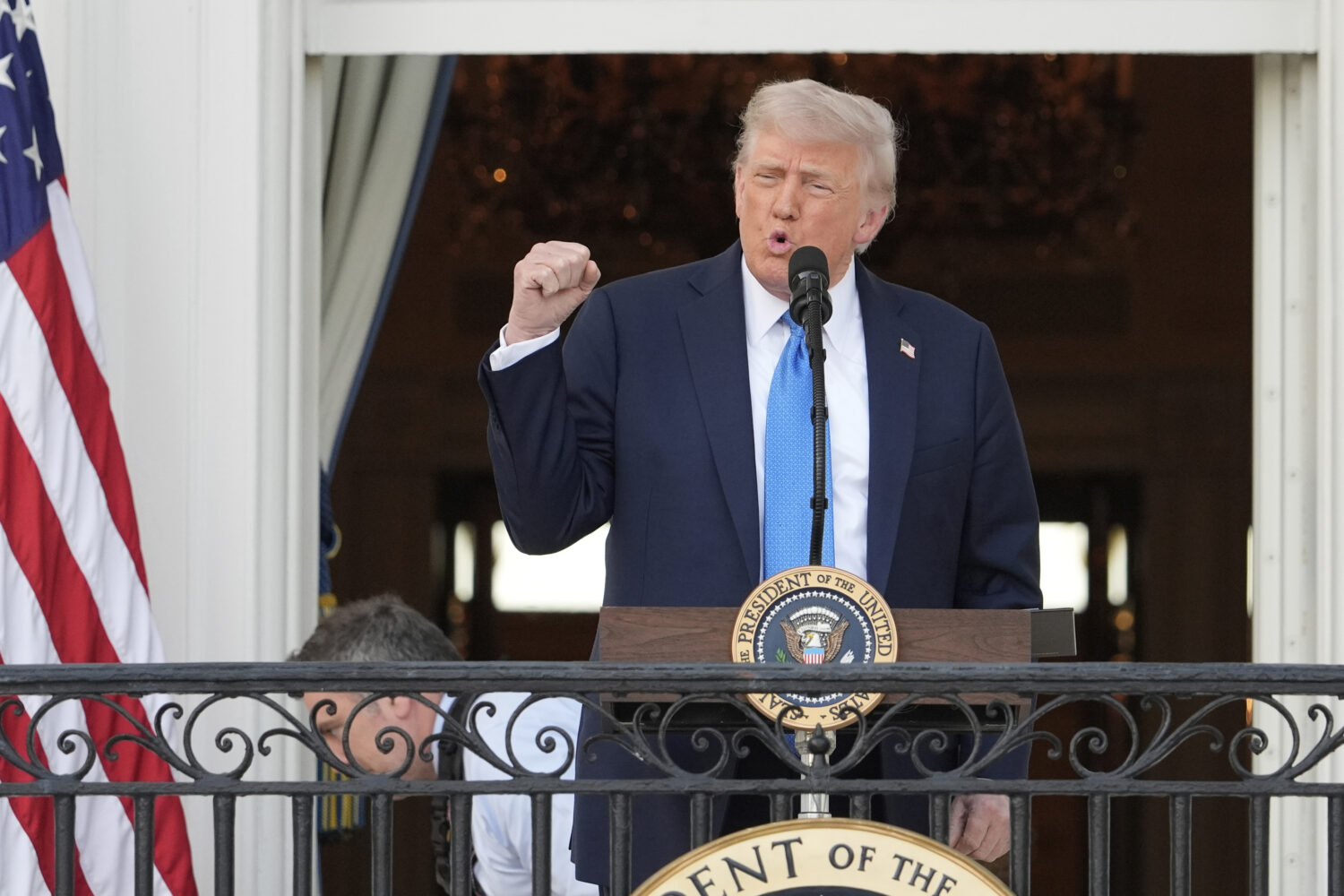 President Donald Trump speaks during a summer soiree on the South Lawn of the White House, Wednesda...