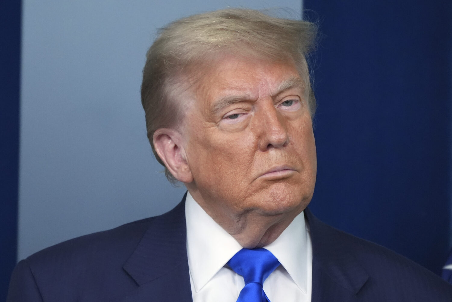 President Donald Trump listens during a briefing with the media, Friday, June 27, 2025, at the Whit...