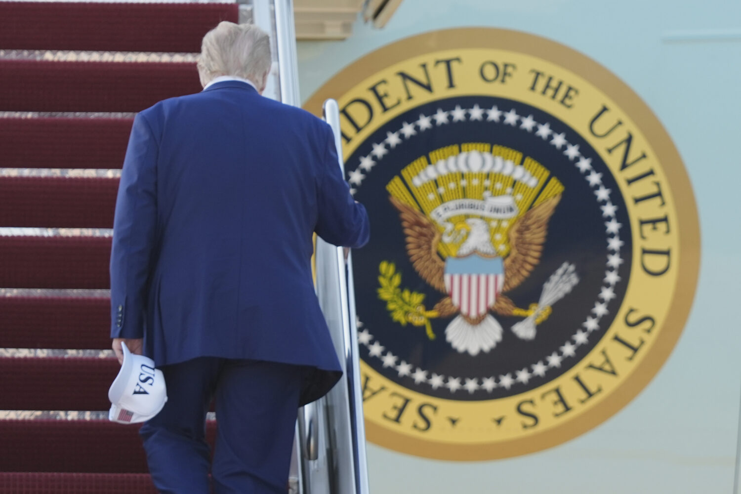 President Donald Trump boards Air Force One, Tuesday, June 24, 2025, at Joint Base Andrews, Md., on...