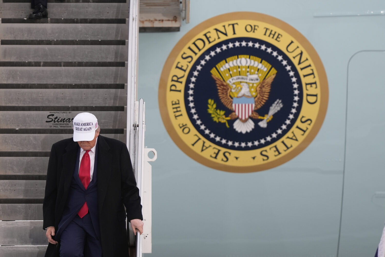 President Donald Trump arrives on Air Force One at Calgary International Airport, Sunday, June 15, ...