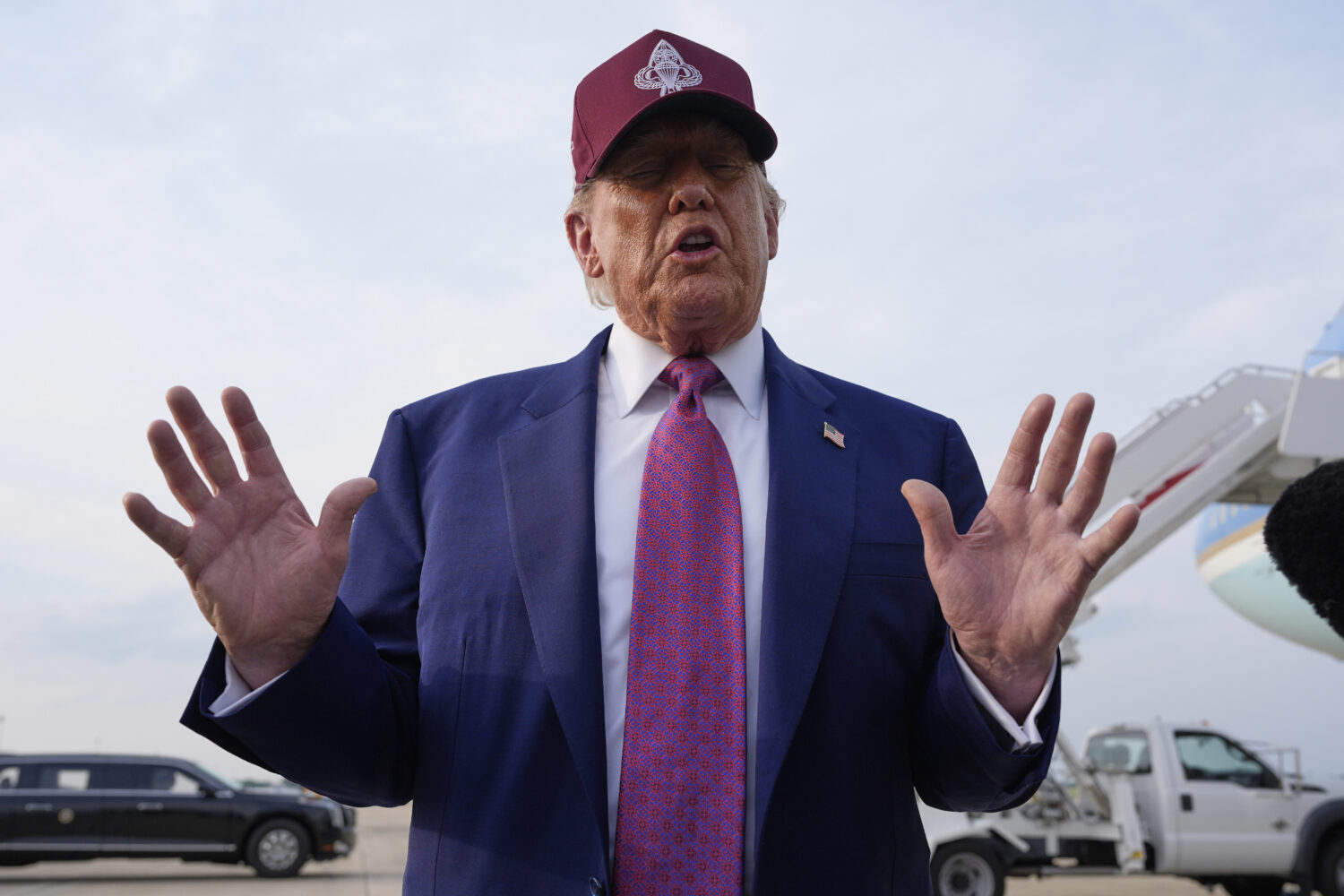 President Donald Trump speaks to reporters after arriving on Air Force One, Tuesday, June 10, 2025,...