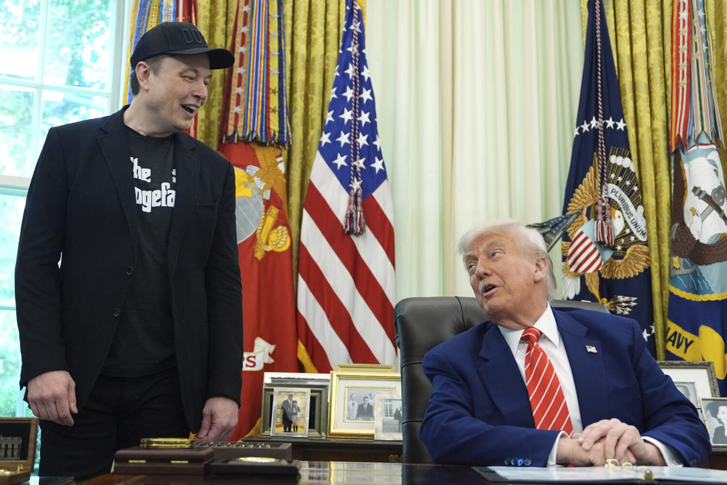 President Donald Trump speaks during a news conference with Elon Musk in the Oval Office of the Whi...