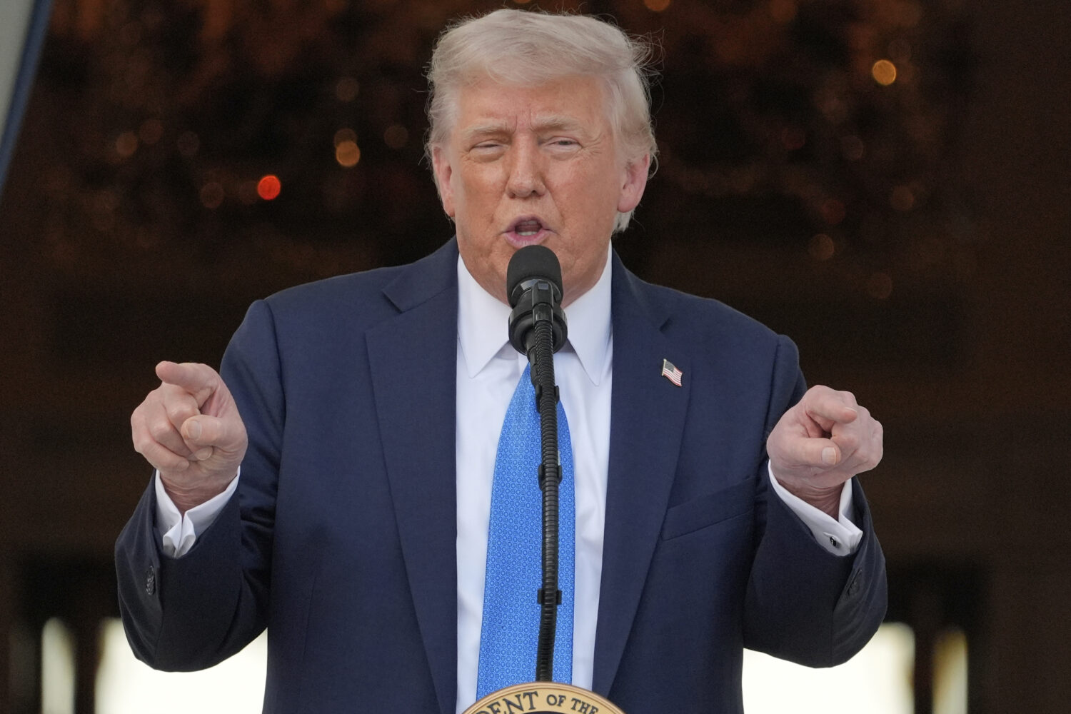 President Donald Trump speaks during a summer soiree on the South Lawn of the White House, Wednesda...