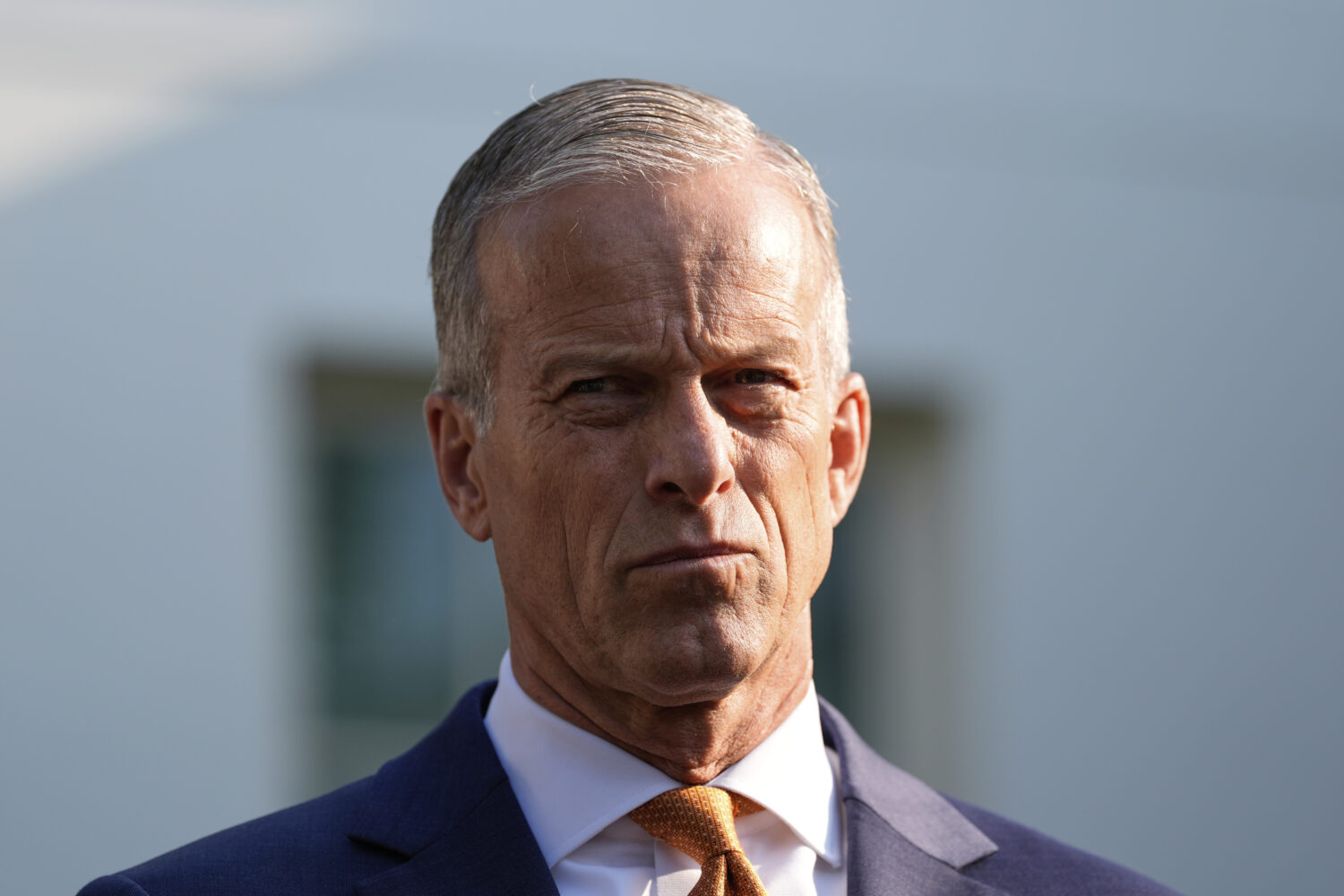 Senate Majority Leader John Thune, R-S.D., speaks with reporters after meeting with President Donal...