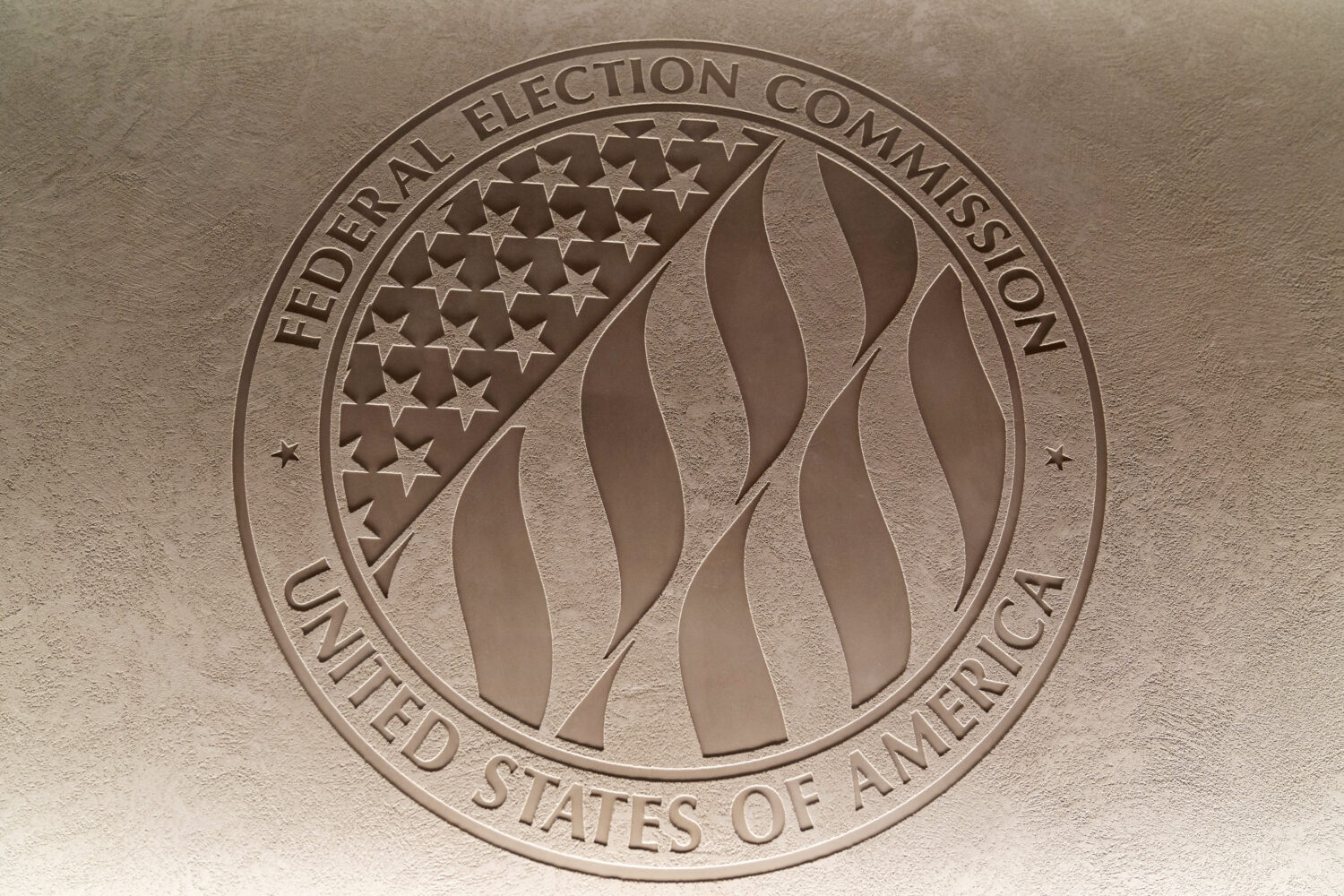 FILE - The Federal Election Commission emblem is seen at the Federal Election Commission headquarte...