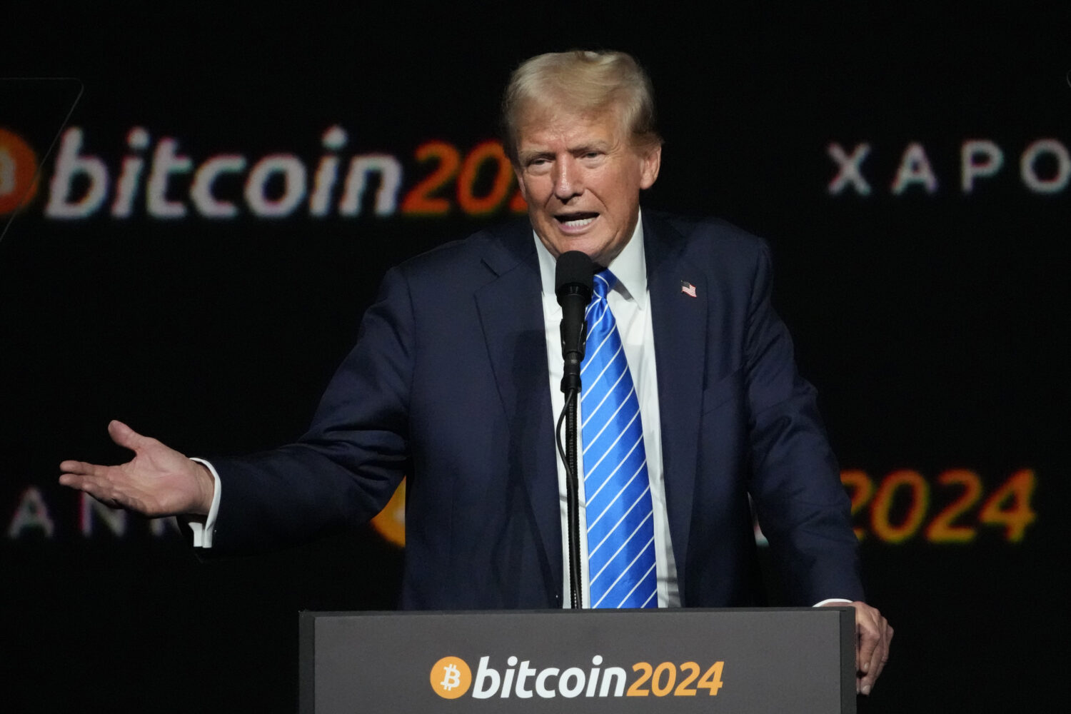 FILE - Donald Trump speaks at the Bitcoin 2024 Conference July 27, 2024, in Nashville, Tenn. (AP Ph...