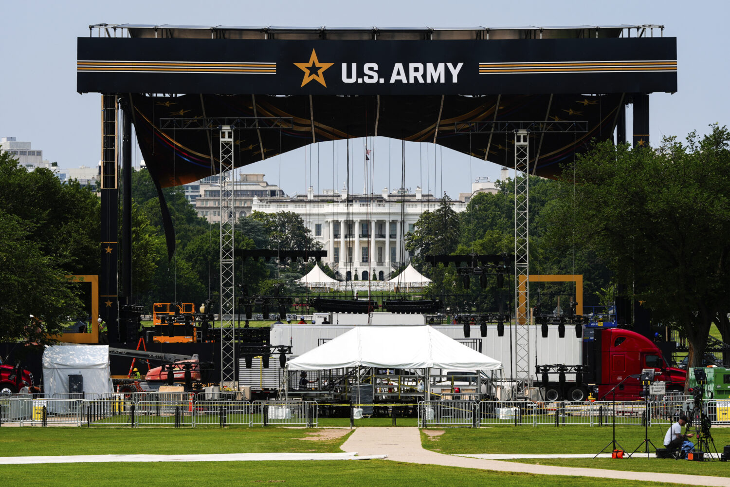 The White House is seen beyond a stage ahead of an upcoming military parade commemorating the Army'...
