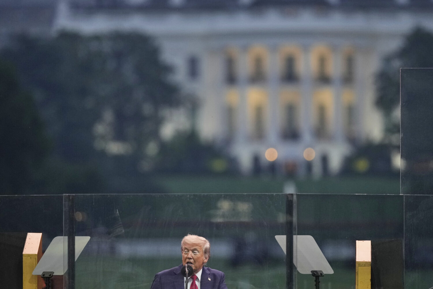 President Donald Trump speaks at a military parade commemorating the Army's 250th anniversary Satur...