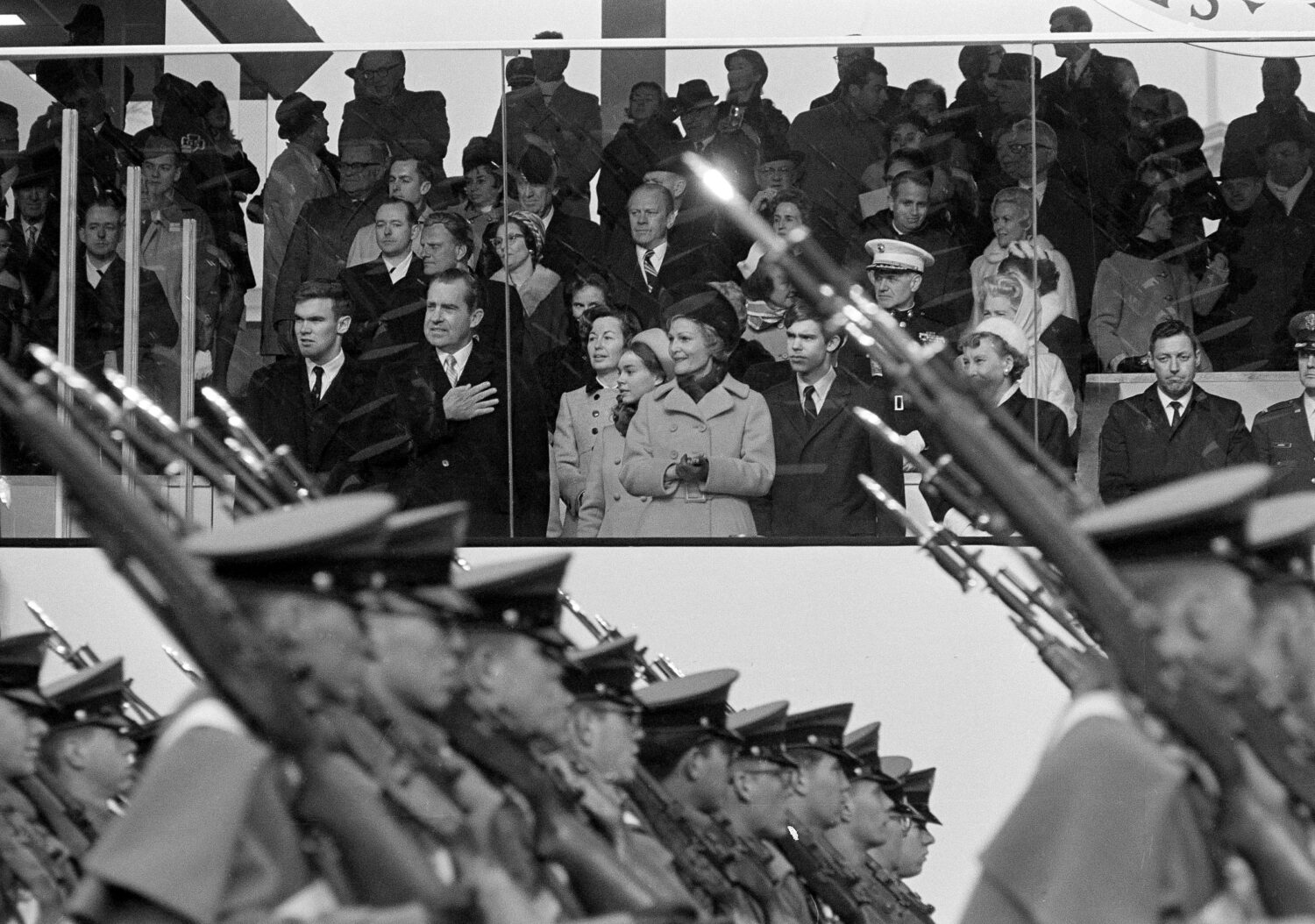 FILE - President Nixon salutes as cadets from the West Point Military Academy pass the presidential...