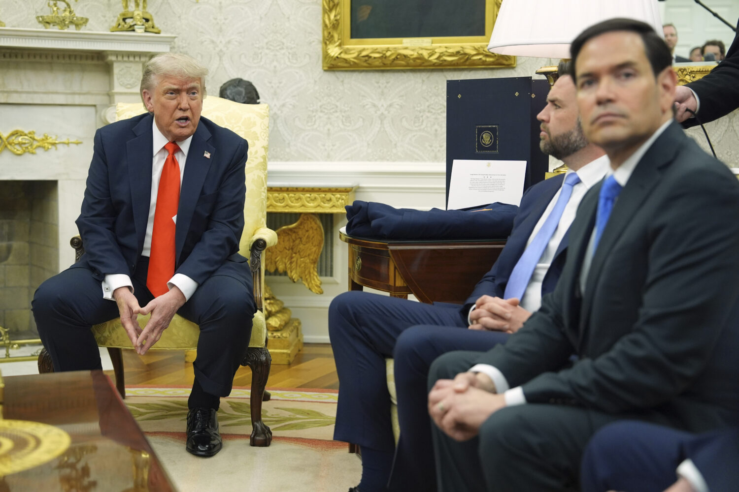 President Donald Trump, left, speaks during a meet withGermany's Chancellor Friedrich Merz, not pic...