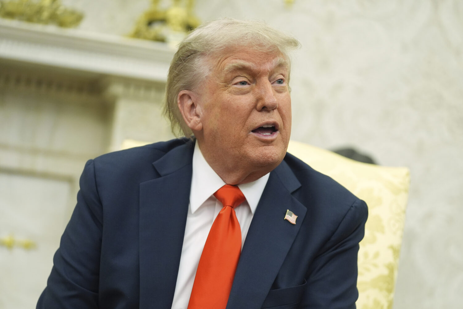 President Donald Trump speaks during a meeting with Germany's Chancellor Friedrich Merz in the Oval...